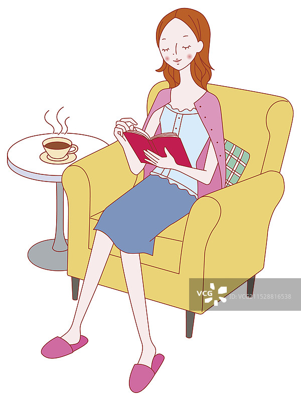 女人坐在沙发上阅读一本书图片素材