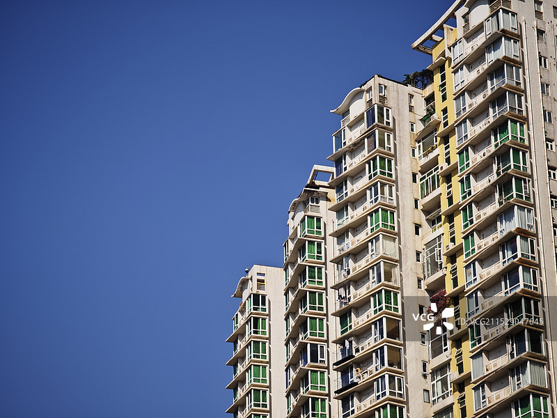蓝天下的居民楼背景图片素材