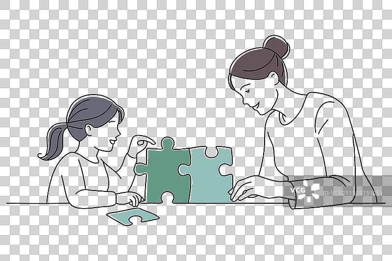 一位女性和孩子一起检查拼图块图片素材