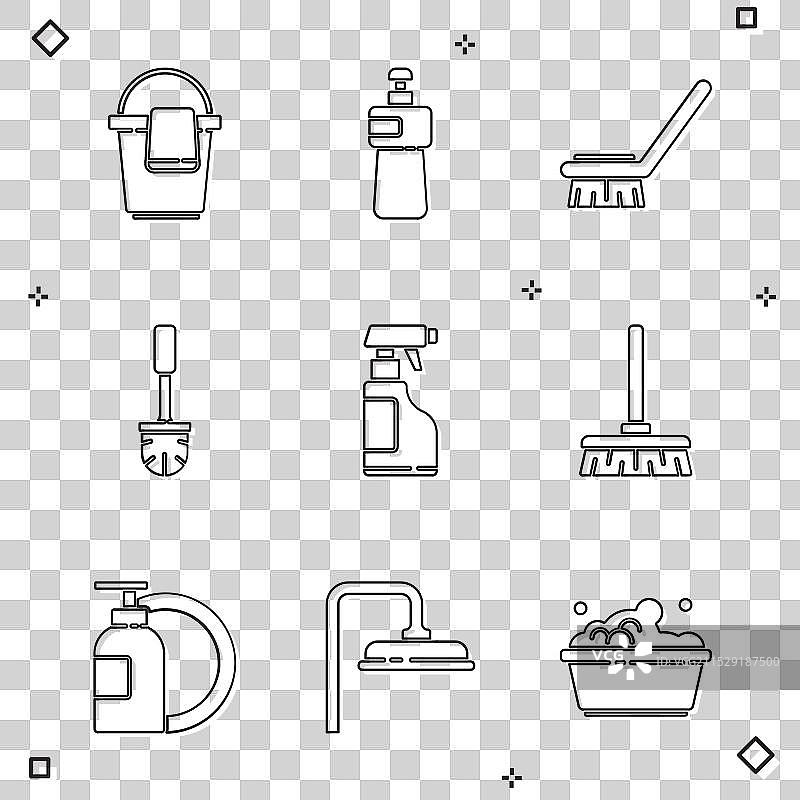 带有抹布的洗碗液瓶和桶图片素材