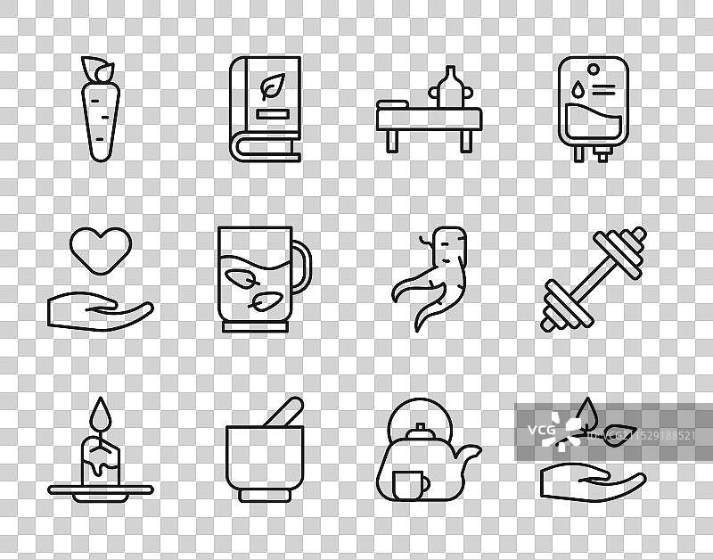 手持香氛蜡烛的叶子放在按摩桌上图片素材