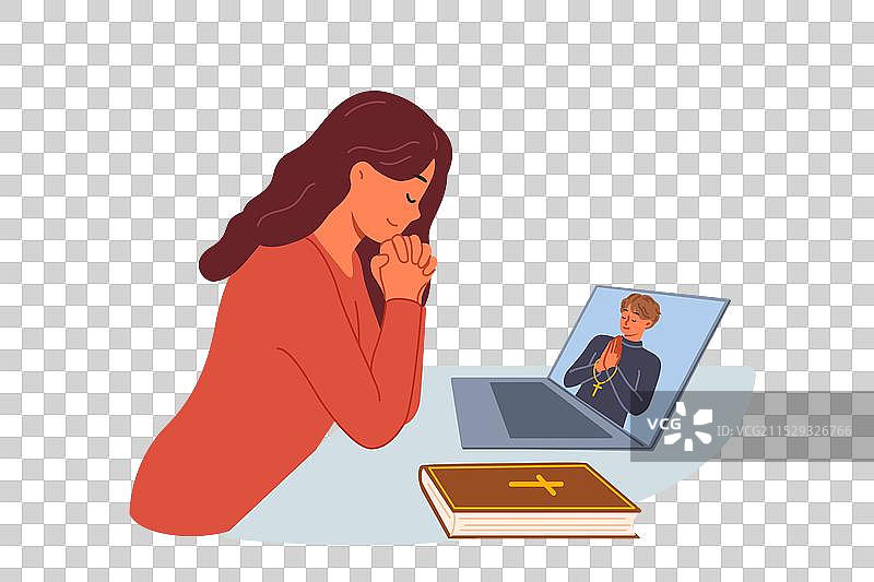 女人坐在笔记本电脑前祈祷图片素材