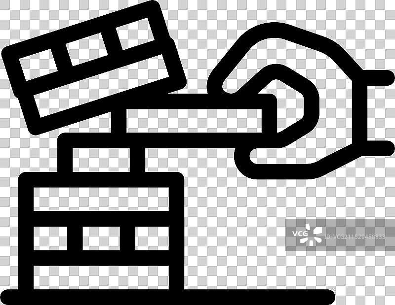 建筑师手工将砖块放置在未完成的结构上图片素材