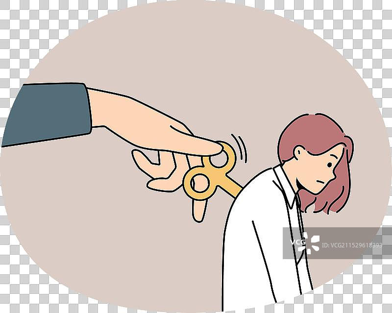 疲惫女性背部的大型发条钥匙图片素材