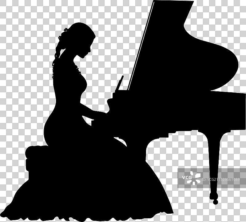 弹钢琴的女性剪影图片素材