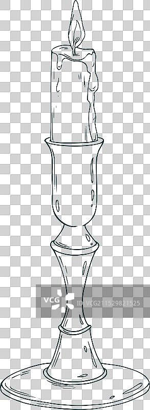 高大的铜色蜡烛台上燃烧着蜡烛图片素材