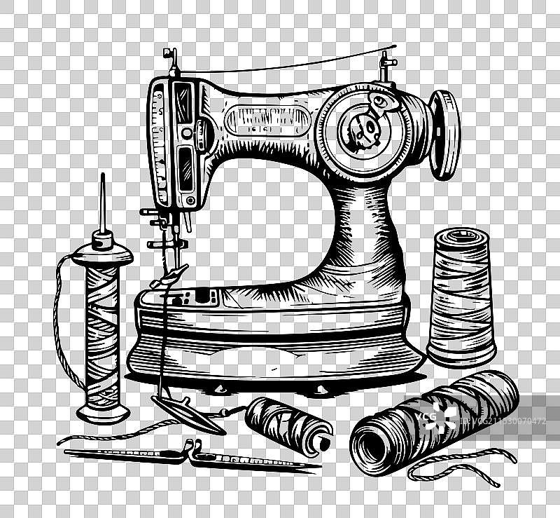 一套缝纫配件和手动缝纫机图片素材