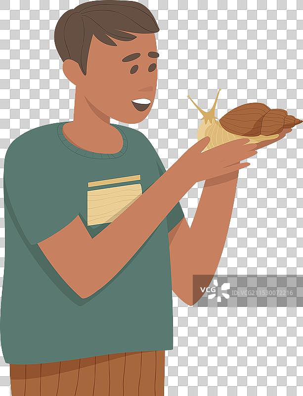 男孩正在抱着他的大蜗牛图片素材