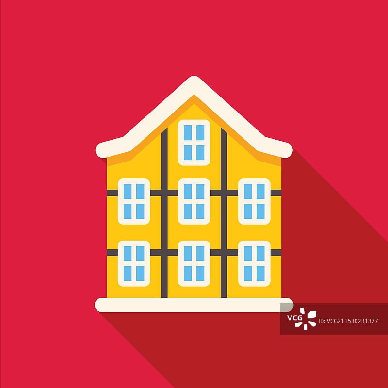 被雪覆盖的黄色公寓大楼图片素材