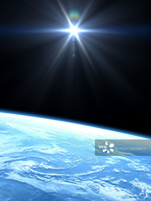 美丽的蓝色地球大气层在阳光照射下，从卫星轨道上看到的景象图片素材