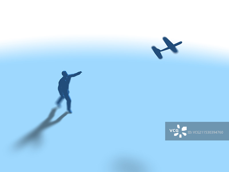 一个男人在放飞纸飞机图片素材