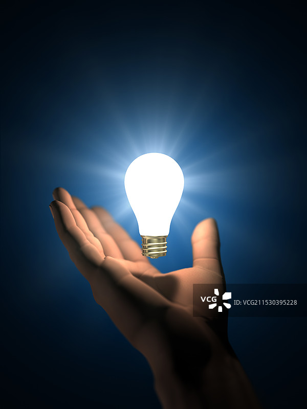 手掌中发光的灯泡图片素材