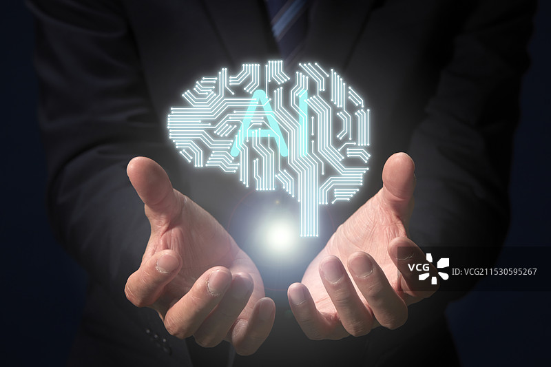CG大脑插图和从男子手中冒出的AI文本图片素材