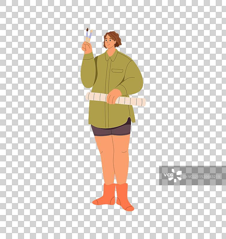 艺术家手持画笔创作艺术作品图片素材