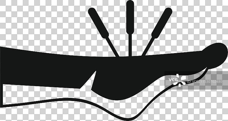 针灸师在脚上放置针头图片素材