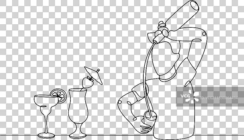 调酒师在酒杯中调制鸡尾酒图片素材