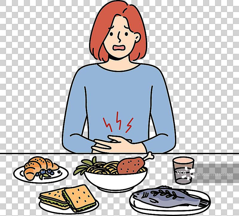 女孩因消化问题而感到腹痛图片素材