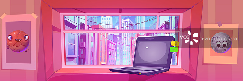 窗台上放着笔记本电脑，透过窗户俯瞰城市景观图片素材