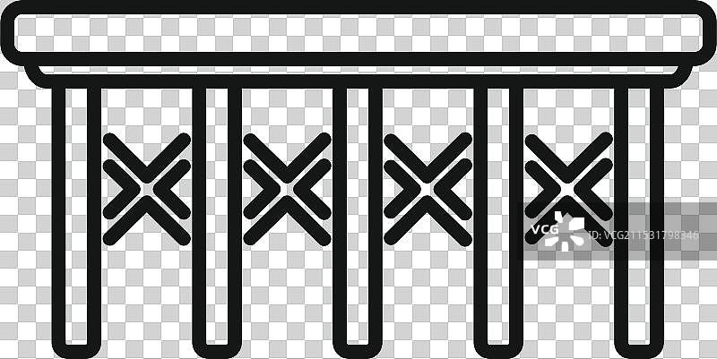 木桥上有X形栏杆，横跨水道图片素材