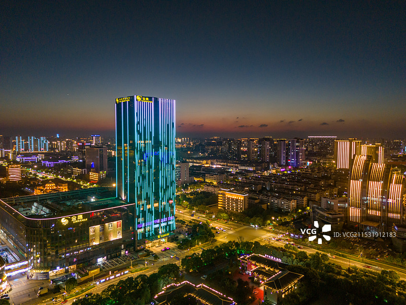 航拍江苏盐城落日夕阳下的城市风光夜景图片素材