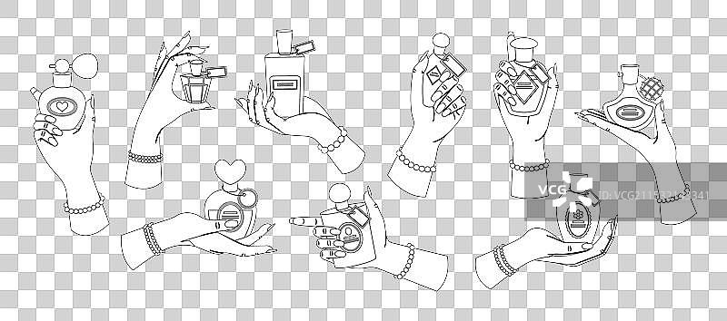 优雅的女性手握着香水瓶图片素材