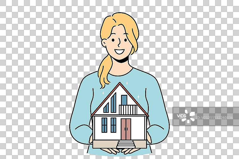 微笑的女性经纪人手持房屋模型图片素材