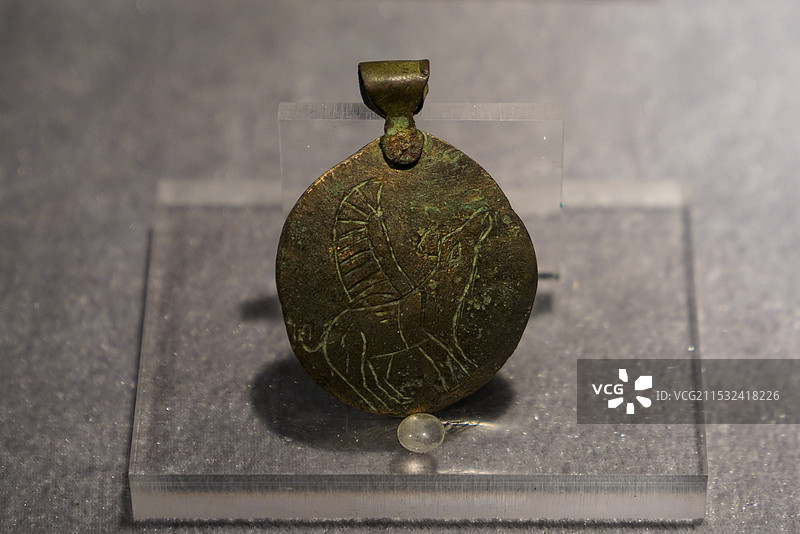 内蒙古 鄂尔多斯 鄂尔多斯青铜器博物馆 铜镜 长翅膀的公羊 印度 哈拉帕文明图片素材