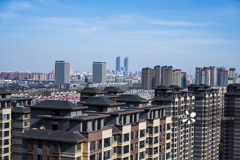 银川西夏区遥望银川地标建筑双子塔图片素材
