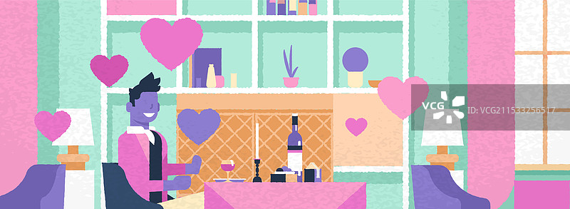 男人坐在咖啡馆的桌子旁，享受浪漫的晚餐，心情愉快。图片素材