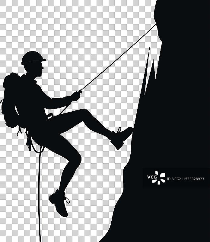 攀登者在陡峭岩壁上攀爬的剪影图片素材