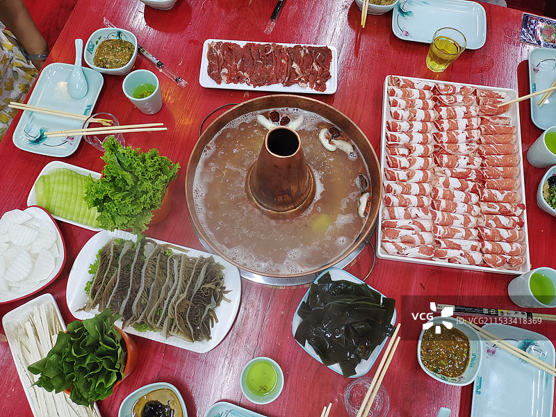 西北特色火锅美食铜锅涮肉图片素材