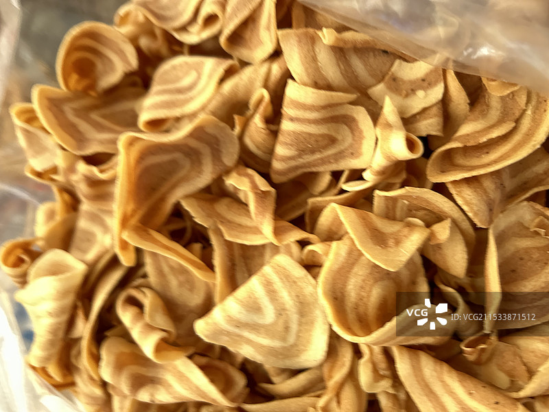 盘子里的猫耳朵零食特写镜头图片素材