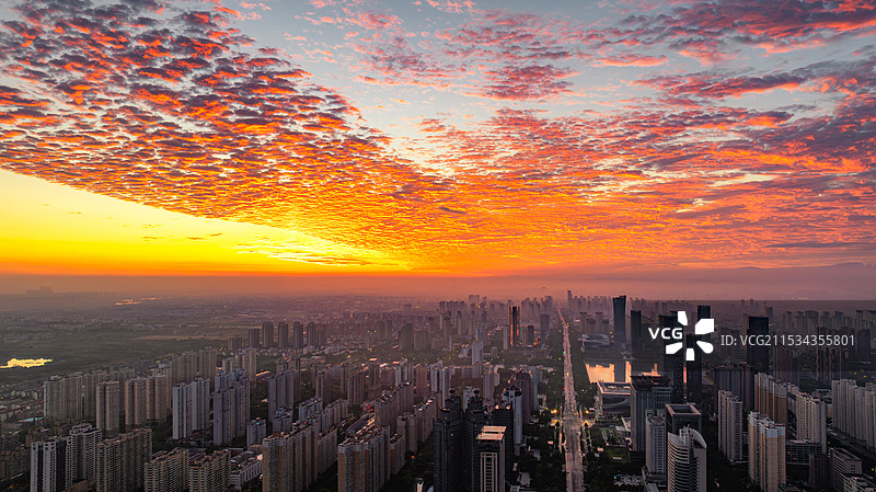 洛阳城市CBD楼房建筑天际线日出朝霞航拍图片素材