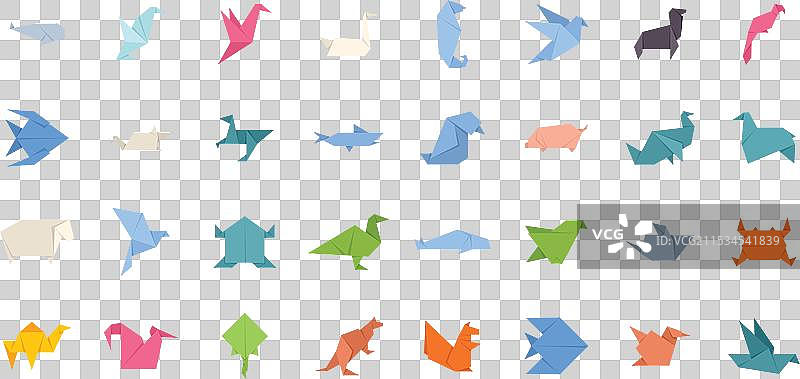 色彩斑斓的折纸动物在白色背景上摆姿势图片素材