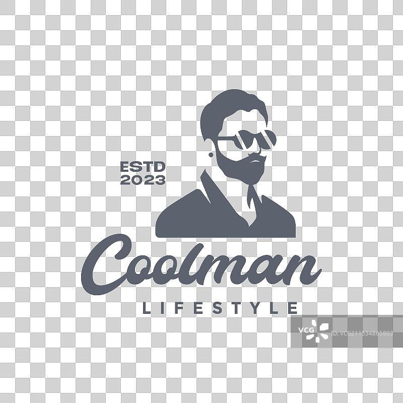 年轻男子酷炫的肖像，留着胡须，戴着太阳镜图片素材