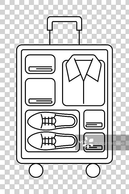 整齐地打包衣物和鞋子在一个图片素材