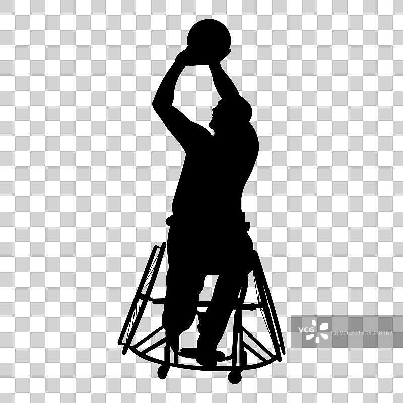 坐在轮椅上的男子在打篮球图片素材