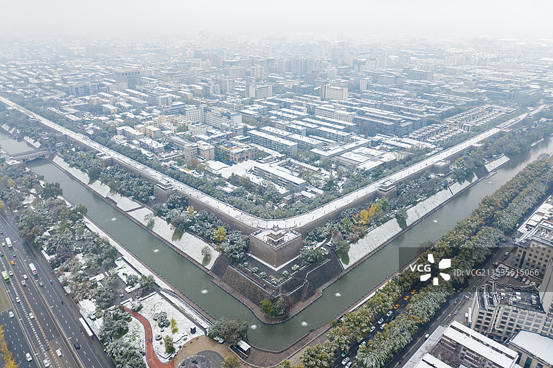 航拍现代城市市区风光雪中城市图片素材