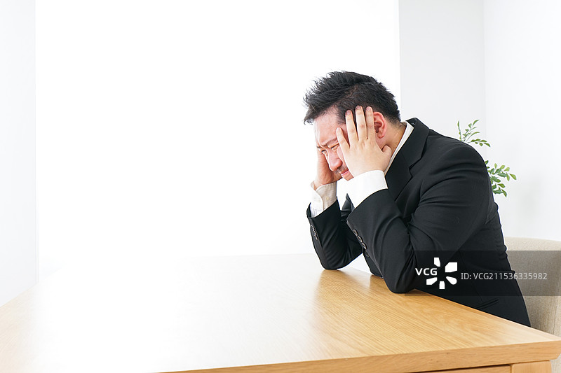 压力大的商人图片素材
