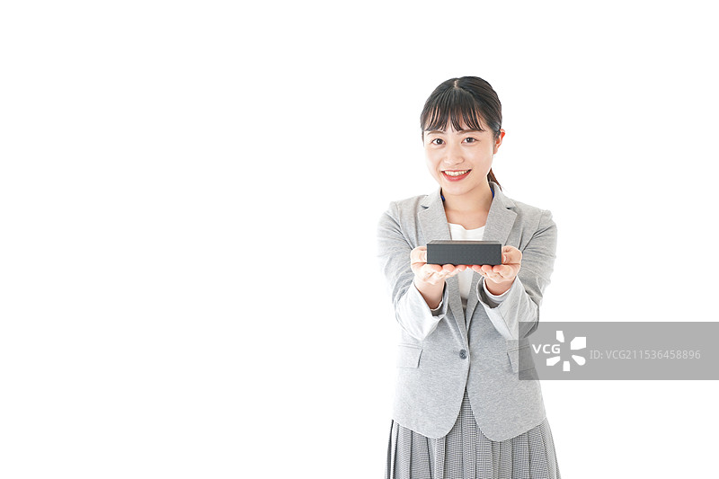 年轻女商人赠送礼物图片素材