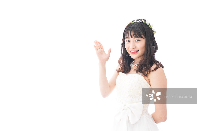 穿着婚纱的新娘进行介绍图片素材