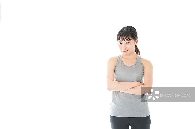 年轻女性穿着运动服图片素材