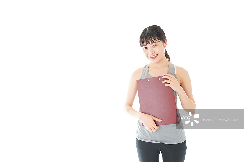 年轻女性穿着运动服图片素材