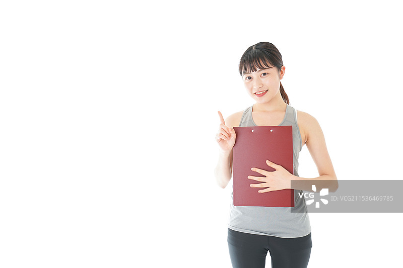 年轻女性穿着运动服图片素材