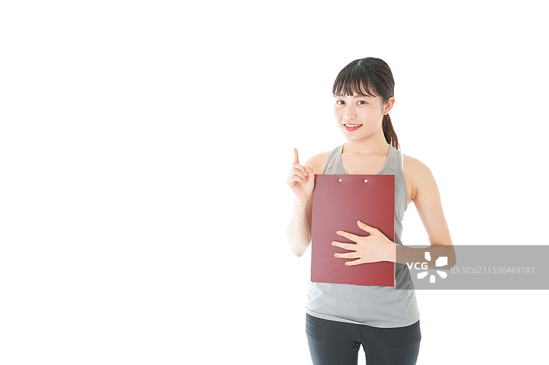 年轻女性穿着运动服图片素材