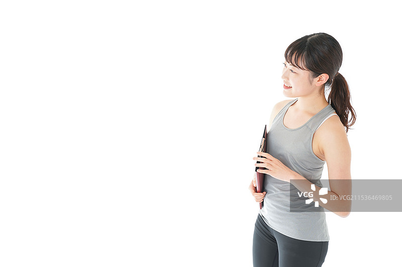 年轻女性穿着运动服图片素材