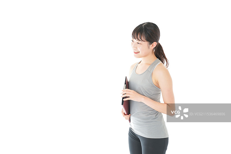 年轻女性穿着运动服图片素材