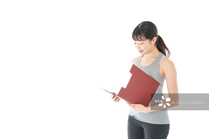 年轻女性穿着运动服图片素材