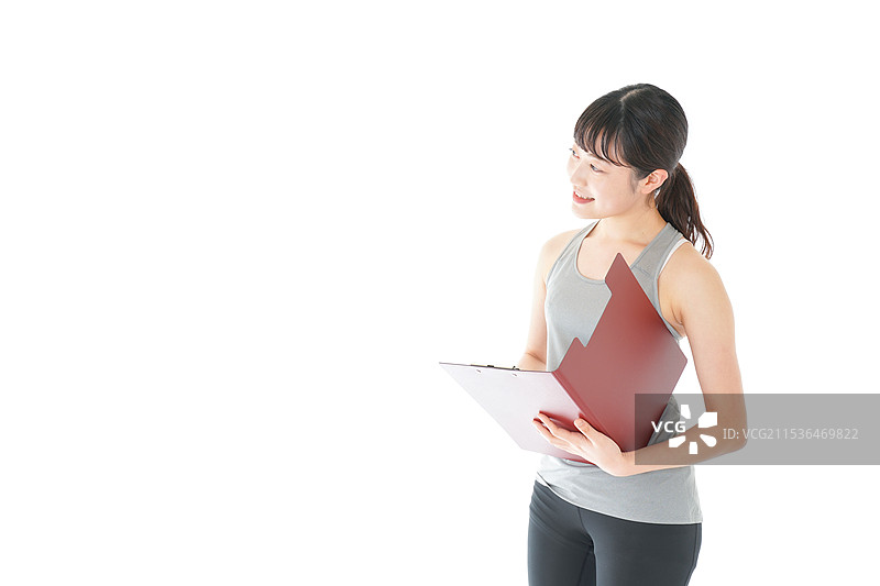 年轻女性穿着运动服图片素材