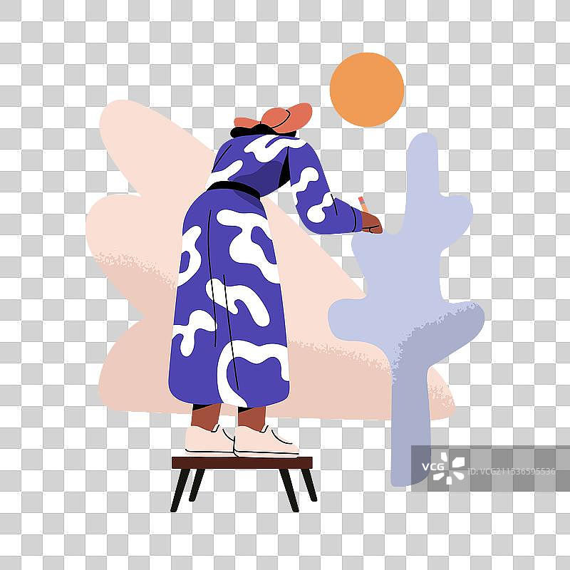 穿着裙子的艺术家从背后绘制墙面艺术图片素材